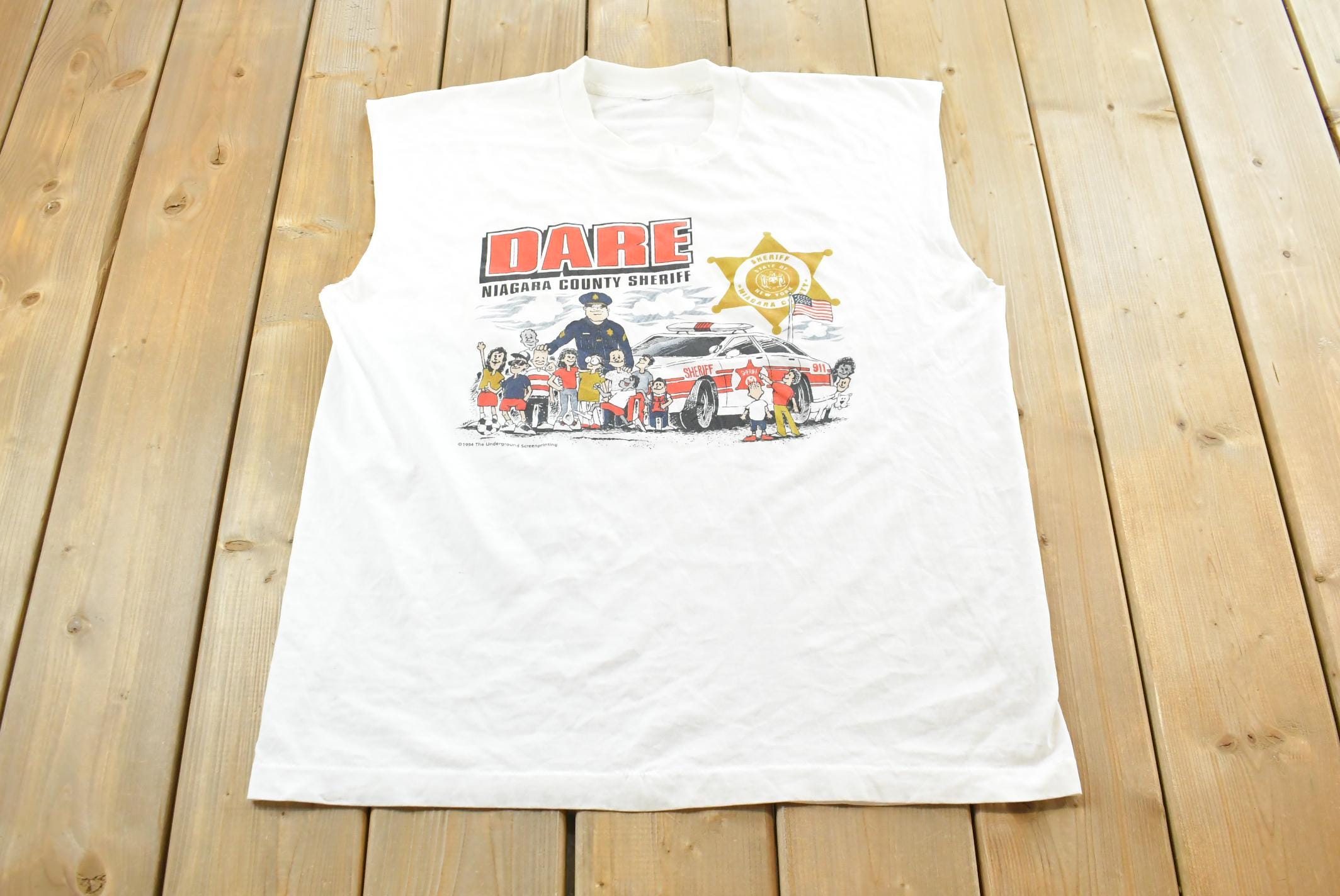 Vintage 1990s Dare to Resist Drugs And Violence Dare Niagara Sheriff Cutoff Tank Top T-Shirt Men's L