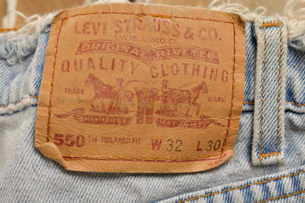 Vintage 1990s Levi's 550 Red Tab Jeans Size 30 x 28.5