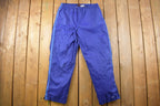 Vintage 1990s Blue Nike Mini Swoosh Track Pants Size L