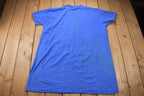 Vintage 1990s Winnie The Pooh Cartoon Blue Pajama T-Shirt