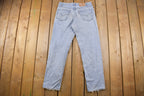 Vintage 1990s Levi's 550 Red Tab Denim Jeans Size 34 x 32