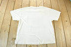 Vintage 1990s Foot Action Graphic T-Shirt