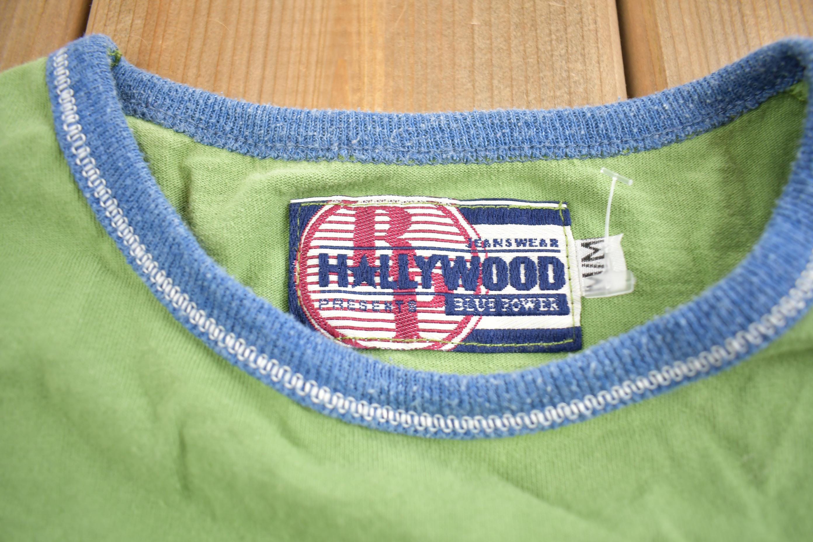 Vintage 1990s Hollywood Jean People Embroidered Graphic T-Shirt Made In USA