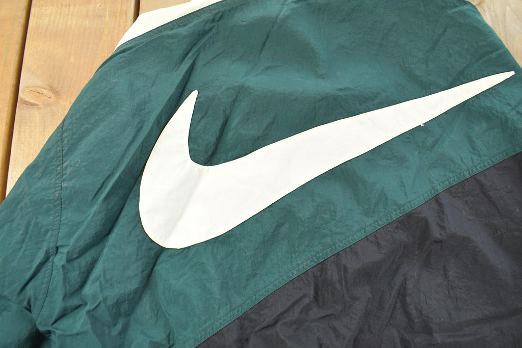 Vintage 1990s Nike Mini Swoosh Windbreaker Jacket Men's Medium