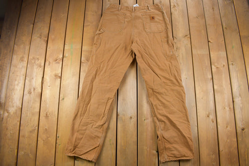 Vintage 1990s Carhartt Lined Carpenter Work Pants Size 34 x 34 / 90s Carpenter Pants / Hype Vintage / Distressed Carhartt / Vintage Workwear