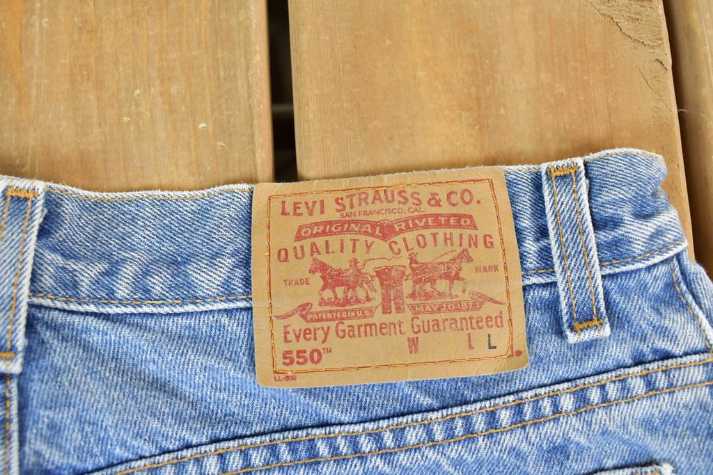 Vintage 1990s Levi Strauss 550 Red Tab Denim Jeans Size 32 x 32
