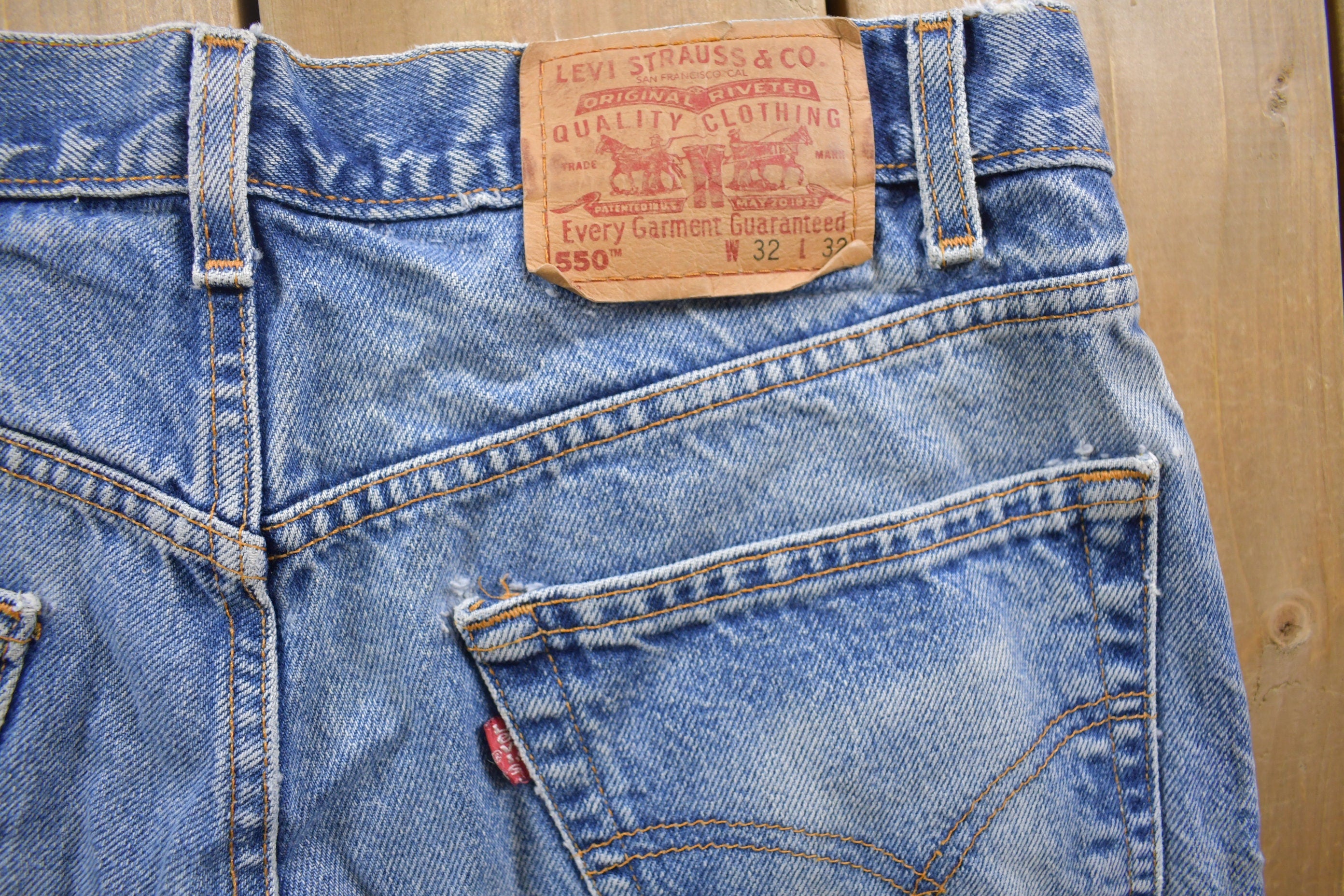 Vintage 1990s Levi's 550 Red Tab Denim Jeans Size 30 x 31
