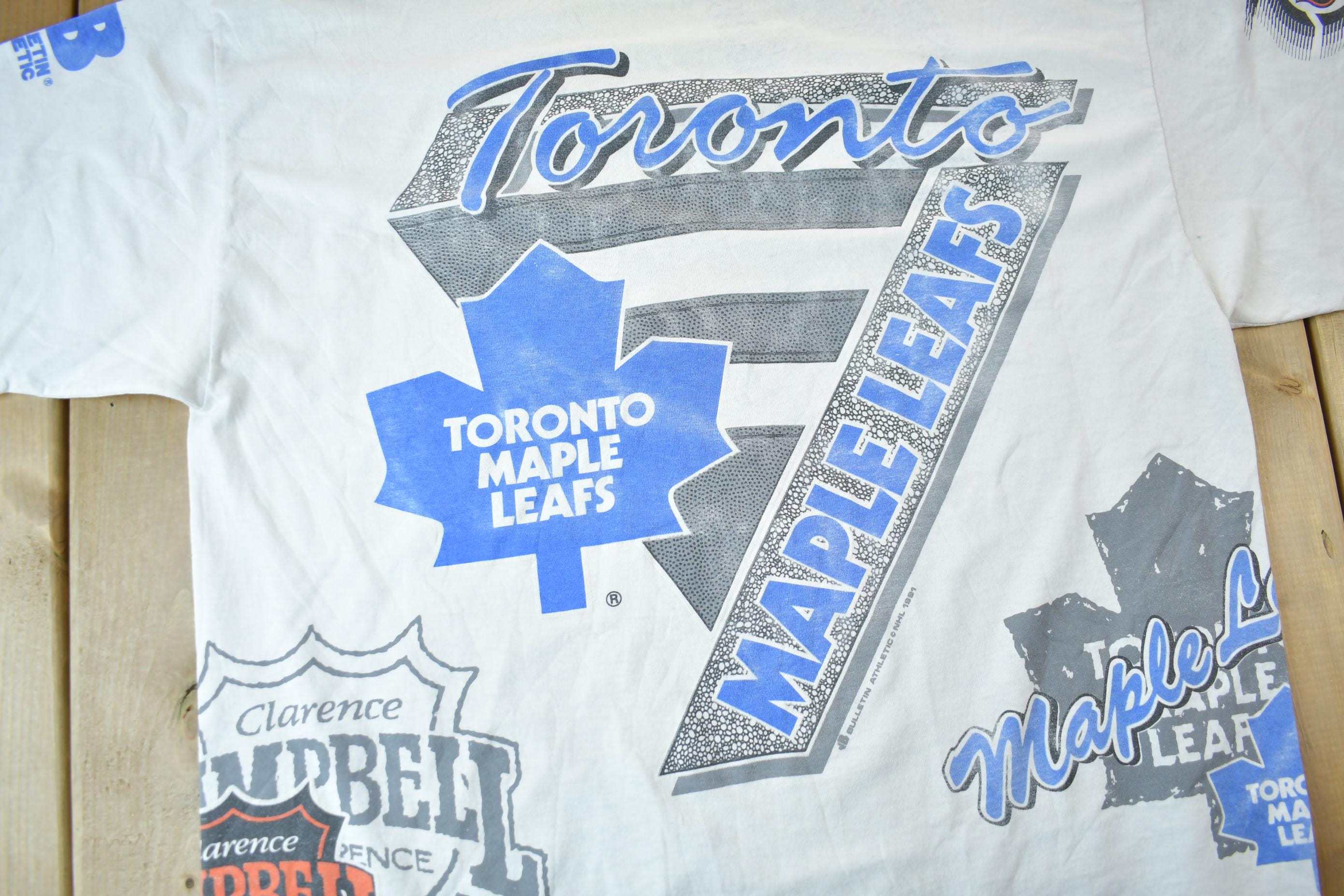 Vintage 1991 Toronto Maple Leafs NHL All Over Print Graphic T-Shirt
