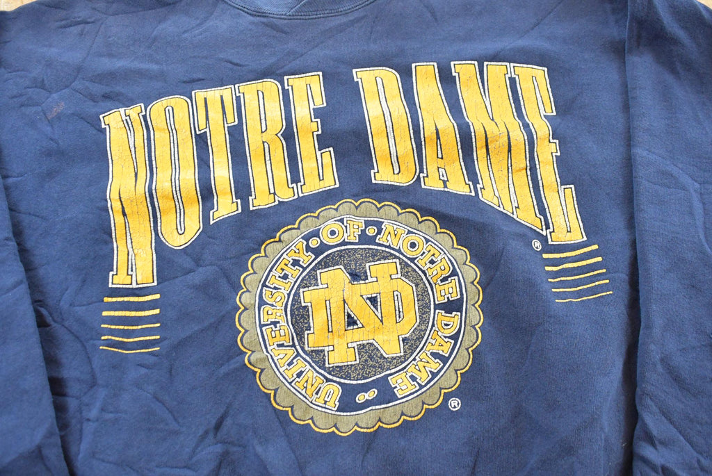 Vintage 1990s Notre Dame University Fighting Irish Thrashed Crewneck Sweatshirt Men's 2XL / NCAA College Spellout Sweater / Made in USA