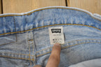 Vintage 1990s Levi's 550 Relaxed Tapered Denim Jeans Women's 28 x 31 / 90s Levi's / Distressed Sun Faded Jeans / Streetwear / Made in USA