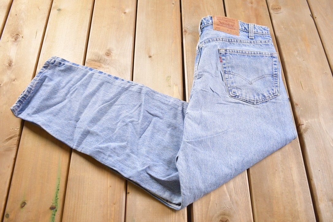 Vintage 1990s Levi 550s Red Tab Jeans Size 34 x 31