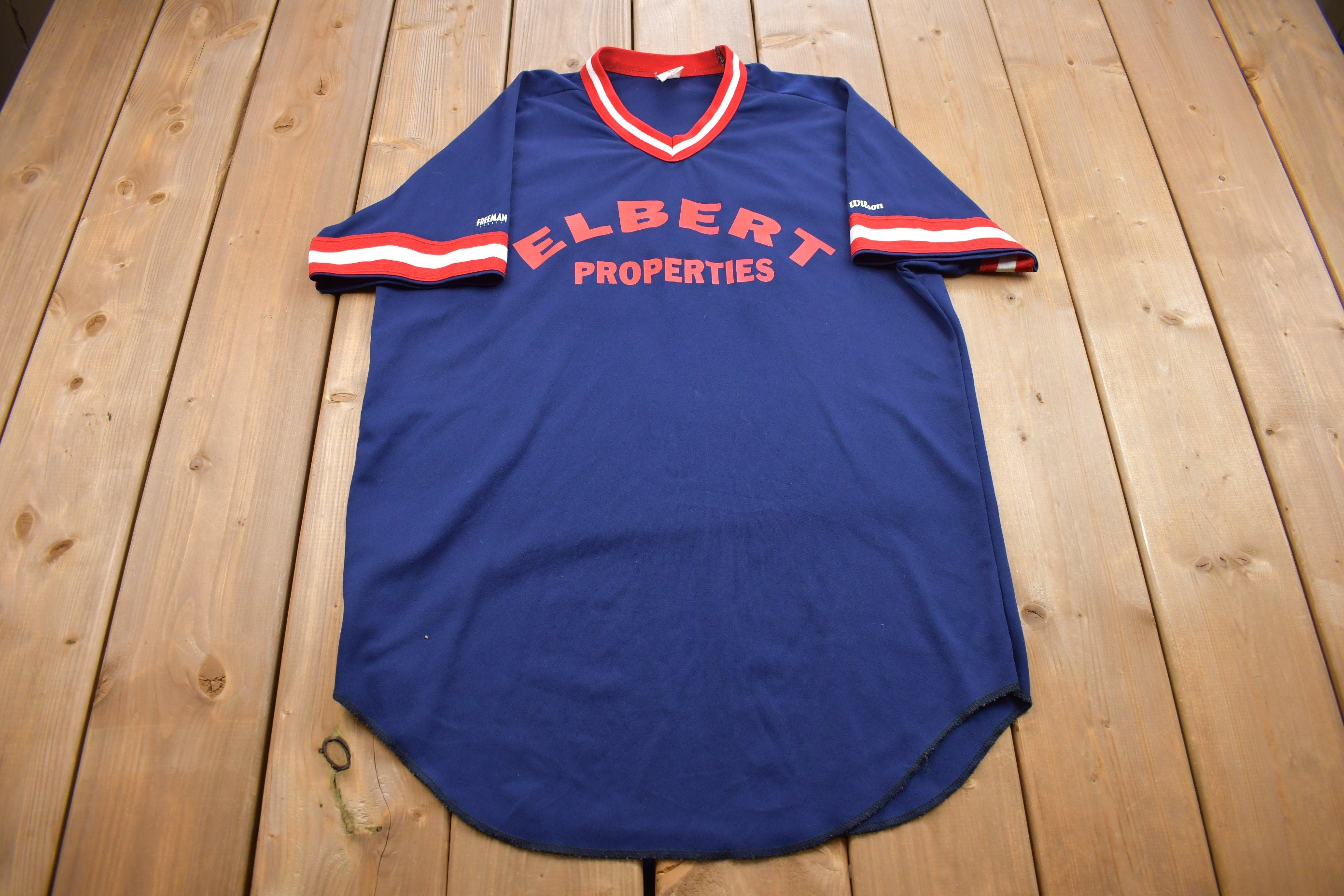 Vintage 1980s Wilson Elbert Properties Graphic T Shirt Jersey