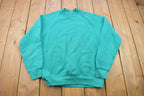 Vintage 1990s Fruit of the Loom Blank Raglan Crewneck Sweatshirt