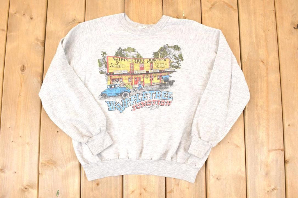 Vintage 1990s Whippletree Junction Vancouver Island Cartoon Graphic Print Crewneck Sweatshirt Men's L