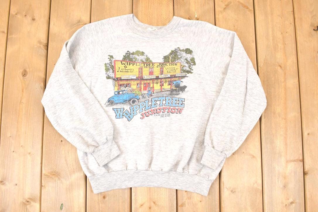 Vintage 1990s Whippletree Junction Vancouver Island Cartoon Graphic Print Crewneck Sweatshirt Men's L