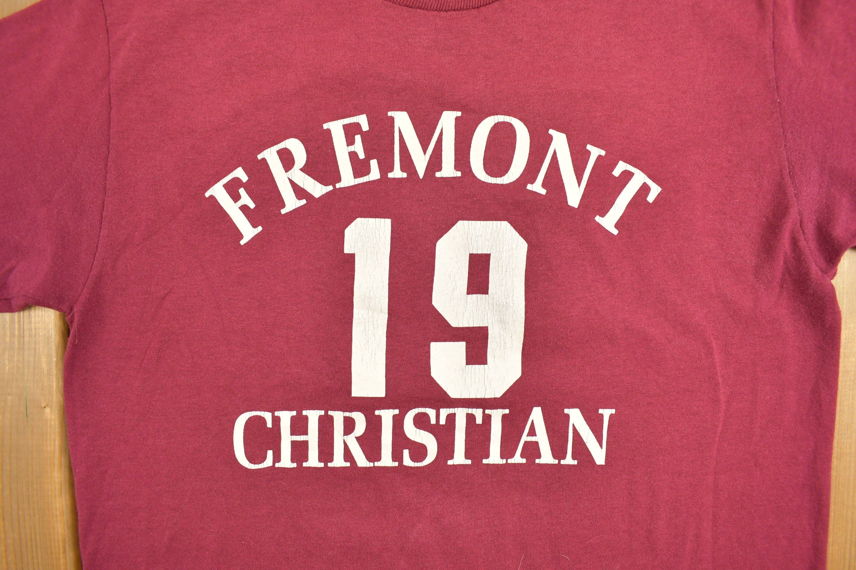 Vintage 1990s Fremont Christian Athletic Graphic T-Shirt Streetwear Single Stitch