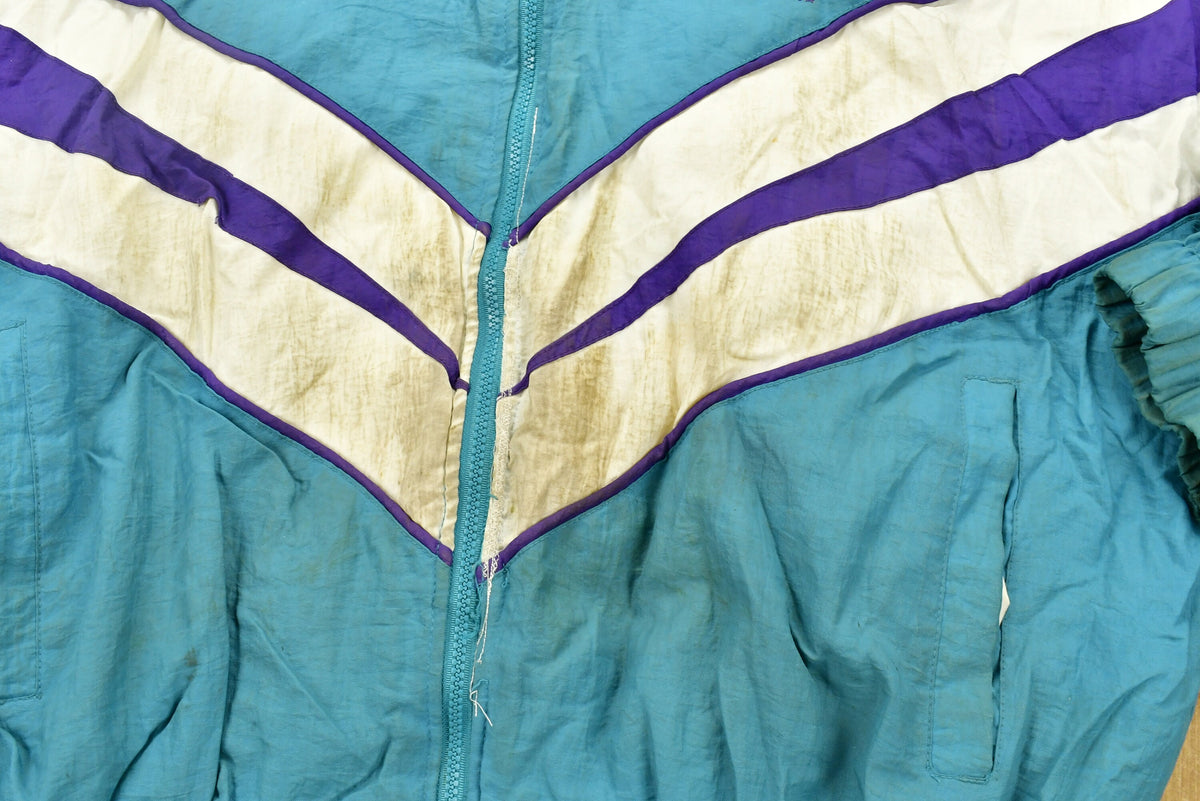 Vintage 1990s Charlotte Hornets NBA Puffer Jacket
