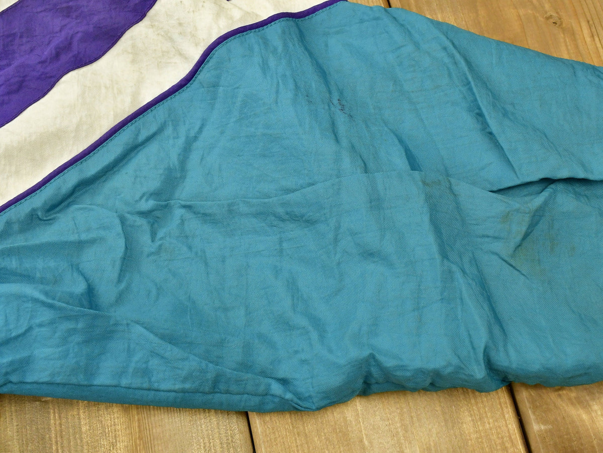 Vintage 1990s Charlotte Hornets NBA Puffer Jacket