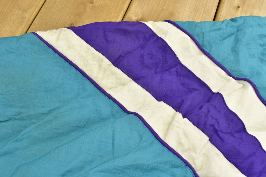 Vintage 1990s Charlotte Hornets NBA Puffer Jacket