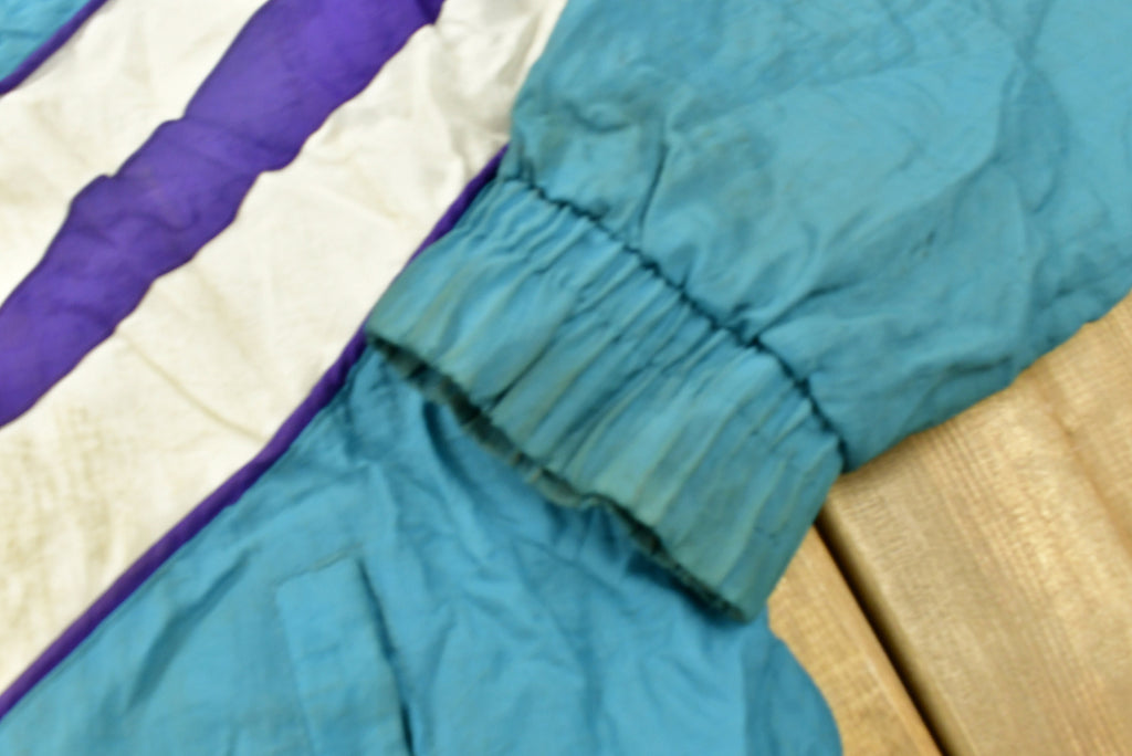 Vintage 1990s Charlotte Hornets NBA Puffer Jacket