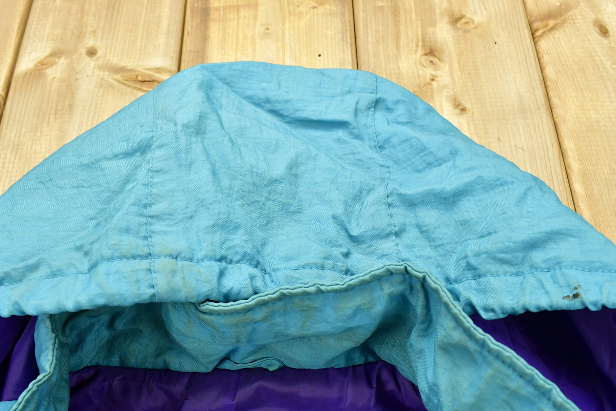 Vintage 1990s Charlotte Hornets NBA Puffer Jacket