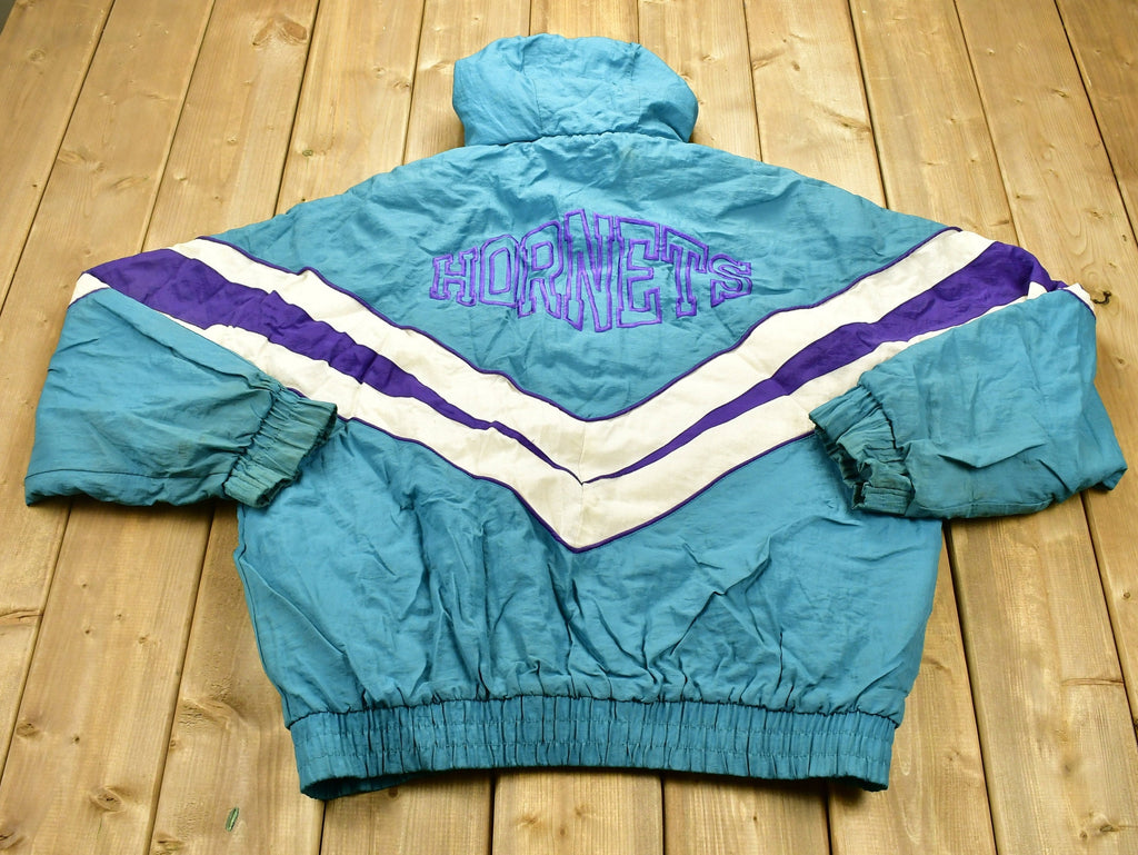 Vintage 1990s Charlotte Hornets NBA Puffer Jacket