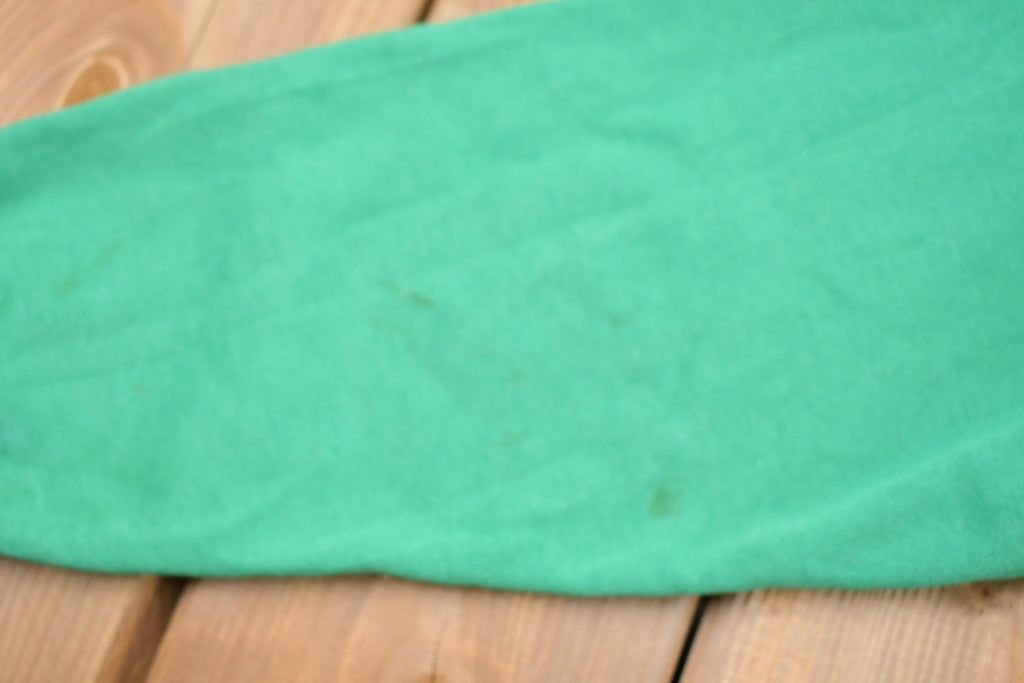 Vintage 1990s Official Christmas Kisser Graphic Crewneck Sweatshirt