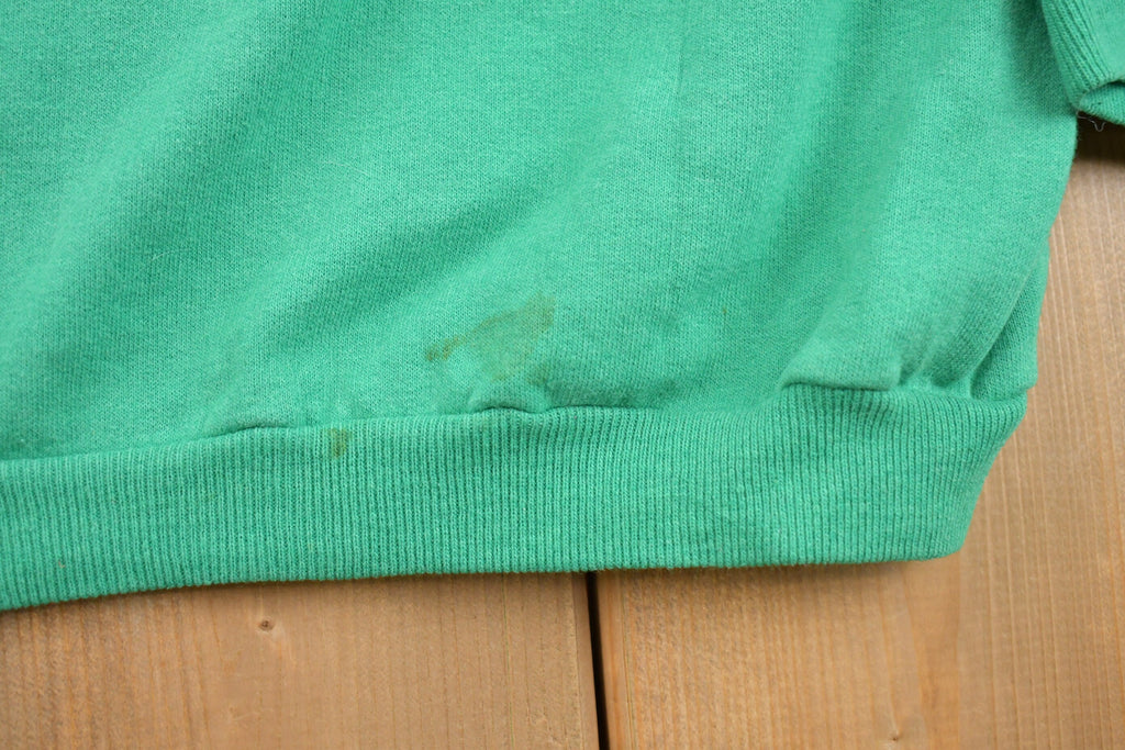 Vintage 1990s Official Christmas Kisser Graphic Crewneck Sweatshirt