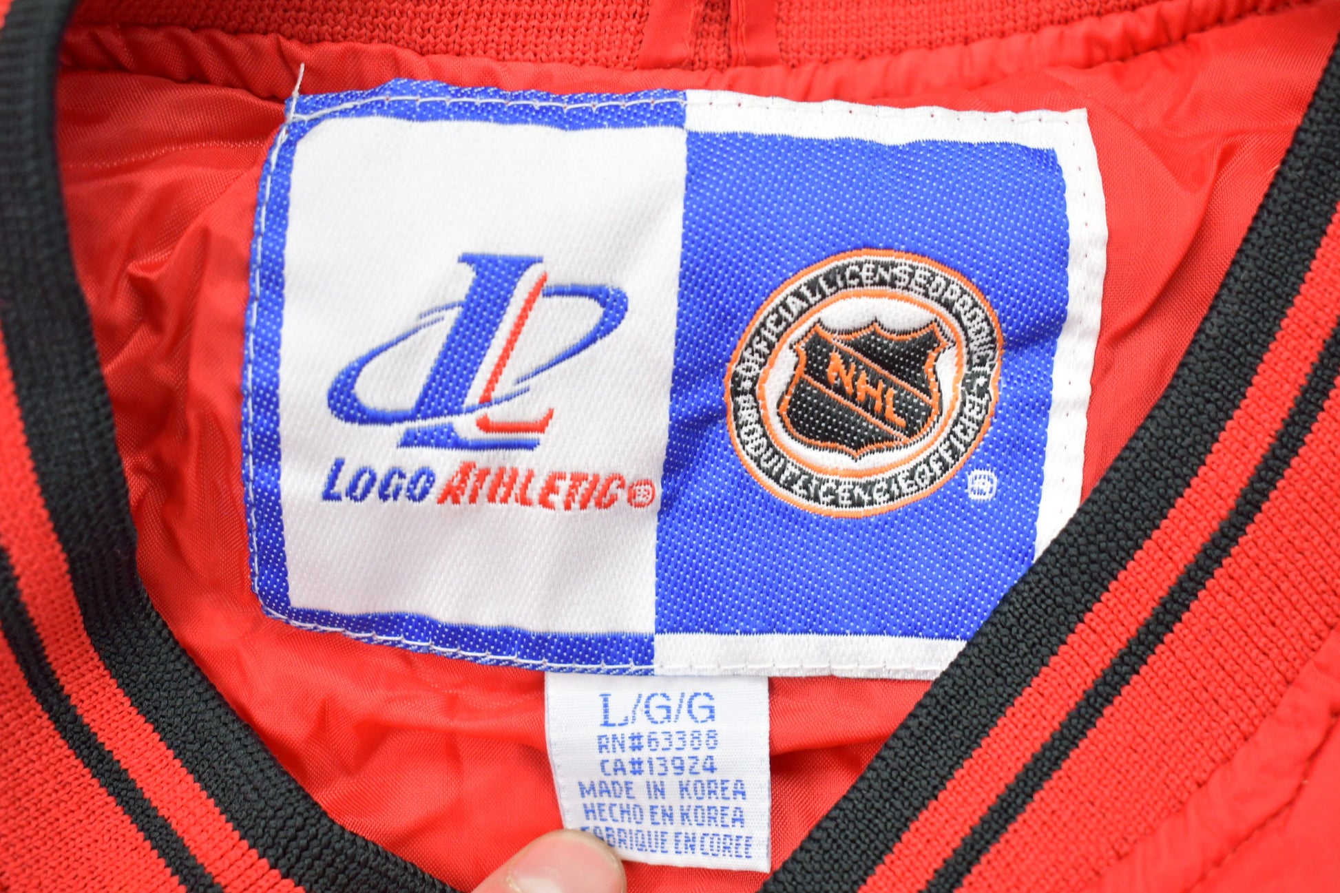 Vintage 1990s Detroit Red Wings NHL Windbreaker Pullover Jacket