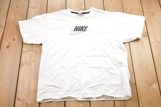 Vintage 1990s Nike Graphic T-Shirt / 90s / Streetwear / Vintage Athleisure / Brand and  Logo / 90's Nike Grey Tag