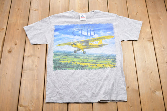 Vintage 1990s J3 Piper Cub Airplane Graphic T-Shirt / Graphic / 80s / 90s / Streetwear / Retro Style / Plane Graphic / Made In USA