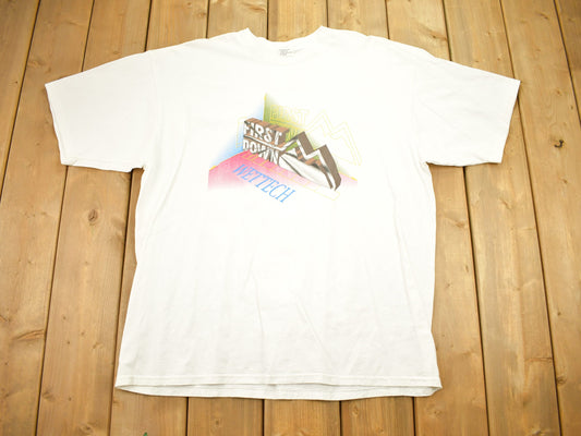 Vintage 1990s First Down Wet Tech T-Shirt / Outdoor Brand Logo / 3D Graphic / 80s / 90s / Streetwear / Retro Style / Made In USA