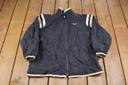 Vintage 1990s Kids Nike Swoosh Embroidered Windbreaker Jacket  Team Logo  Athletic Spring Summer Sportswear  Streetwear  Athleisure