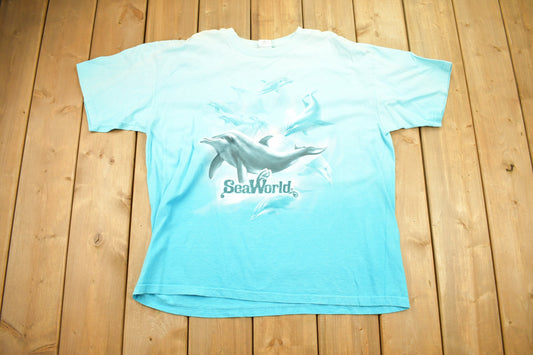 Vintage 1990s Sea World Souvenir T Shirt / Animal / Dolphin Graphic / Faded / Color Gradient / Travel / Souvenir T-Shirt / Streetwear