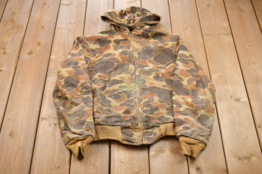 Vintage 1990s Youth Carhartt Camo Hooded Jacket / Workwear / Streetwear / Made In USA / 90s / Lined Jacket / Distressed Carhartt Union Made