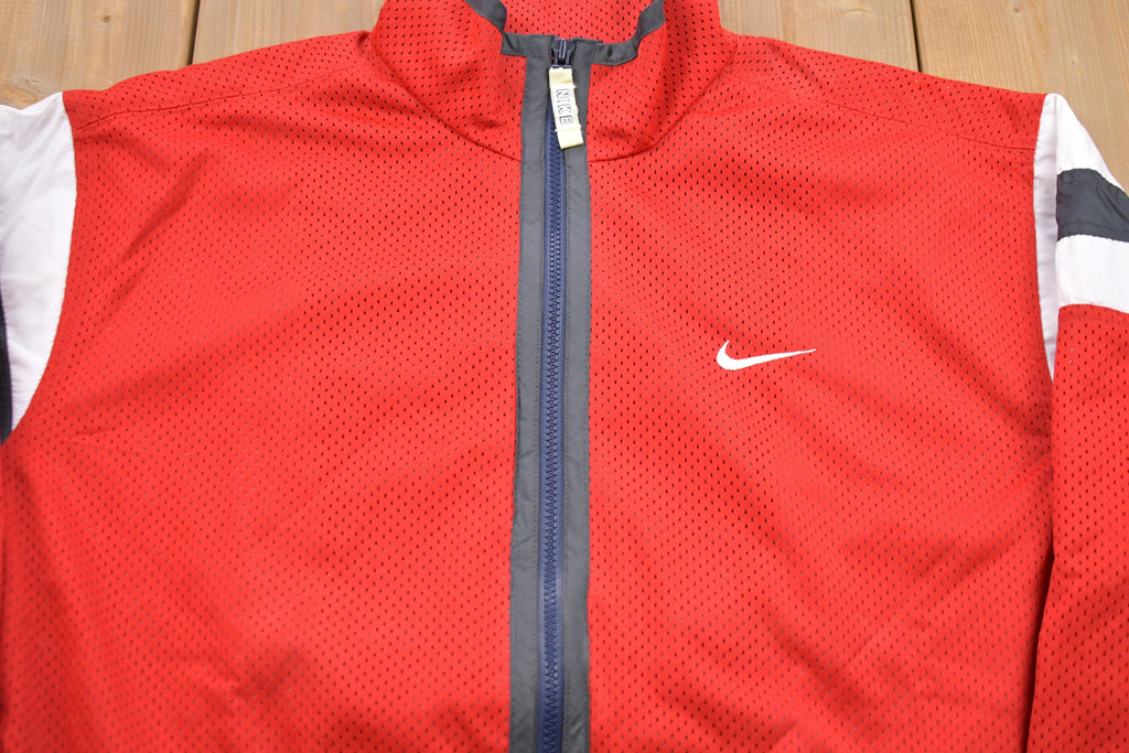 Vintage 1990s Nike Mesh Windbreaker Jacket