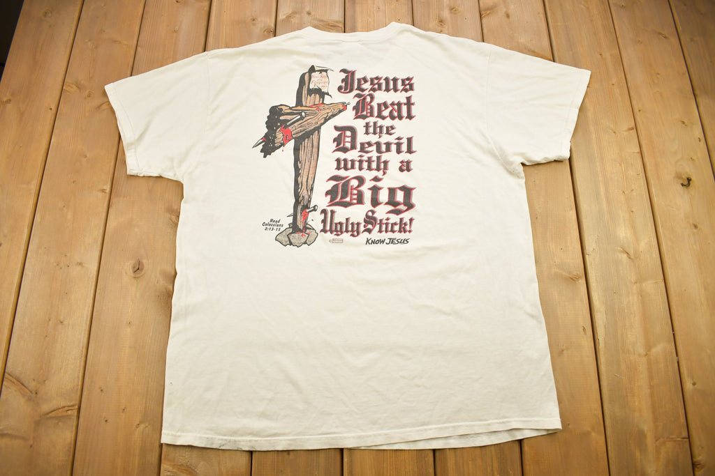 Vintage 1990s "Jesus Beat The Devil With A Big Ugly Stick" Know Jesus Graphic T-Shirt