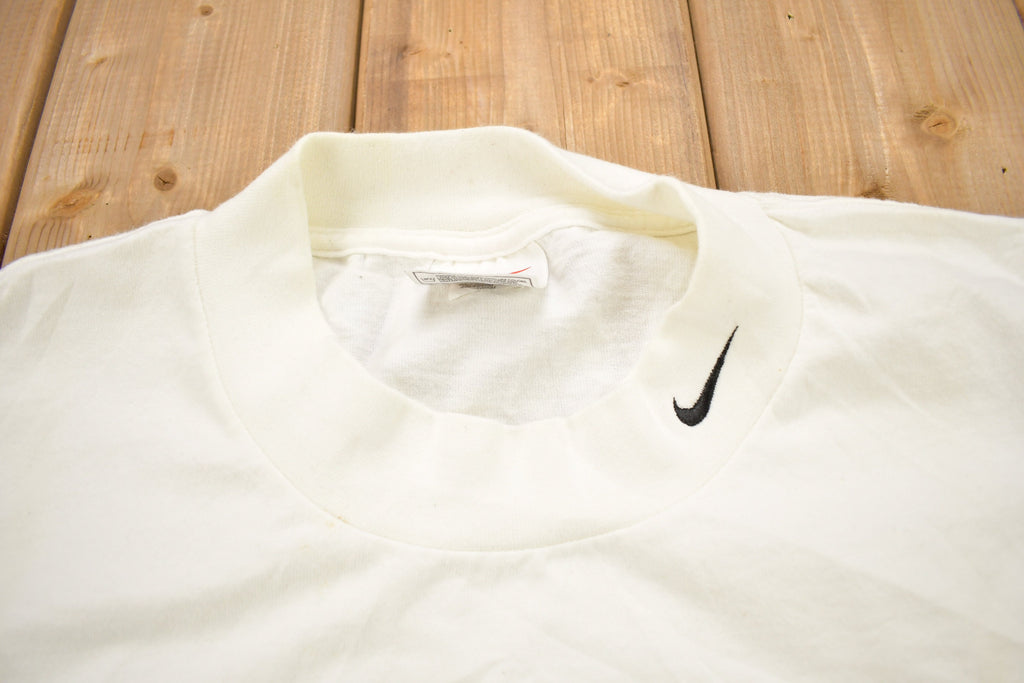 Vintage 1990s Nike Embroidered Mini Swoosh Mock Neck Shirt