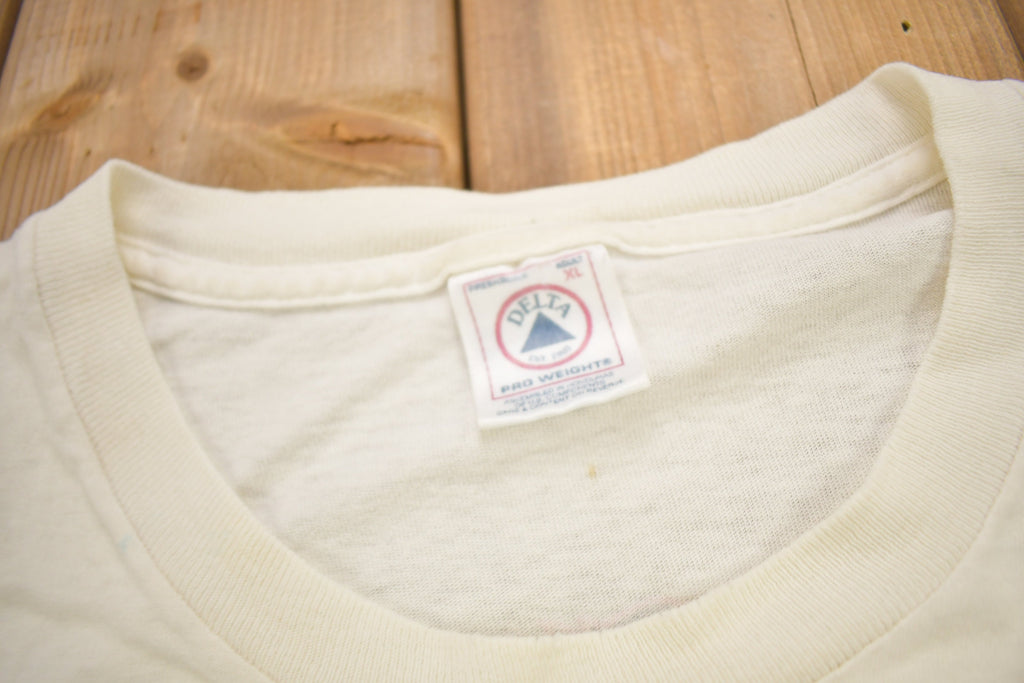 Vintage 1990s "Jesus Beat The Devil With A Big Ugly Stick" Know Jesus Graphic T-Shirt