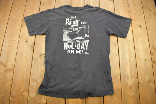 Vintage 1990s No Fear "This Ain't No Holiday On Ice" Hockey Theme Graphic T Shirt / Graphic Tee / Single Stitch / Made In USA