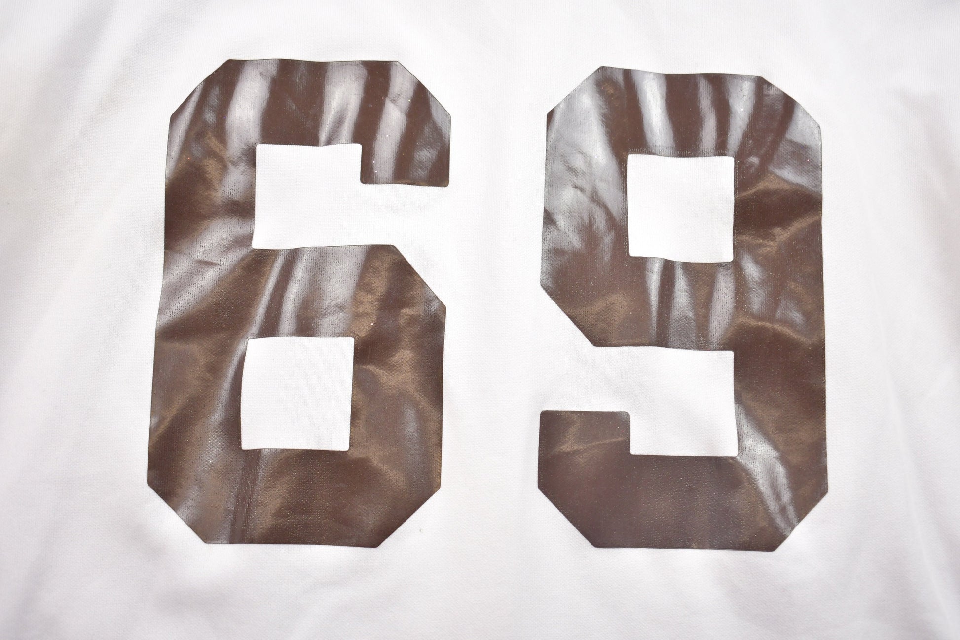 Vintage 1980s Rawling Gusky Number 69 NFL Graphic T-Shirt