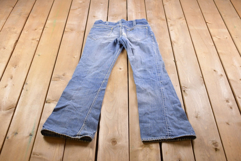 Vintage 1970s Distressed Lee Bell Bottom Jeans Size 28 x 33