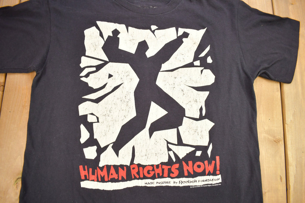 Vintage 1980s Reebok Concerts For Human Rights Graphic T-Shirt Single Stitch