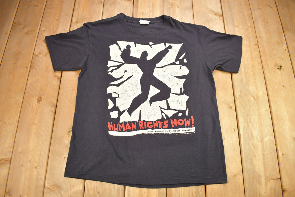 Vintage 1980s Reebok Concerts For Human Rights Graphic T-Shirt Single Stitch