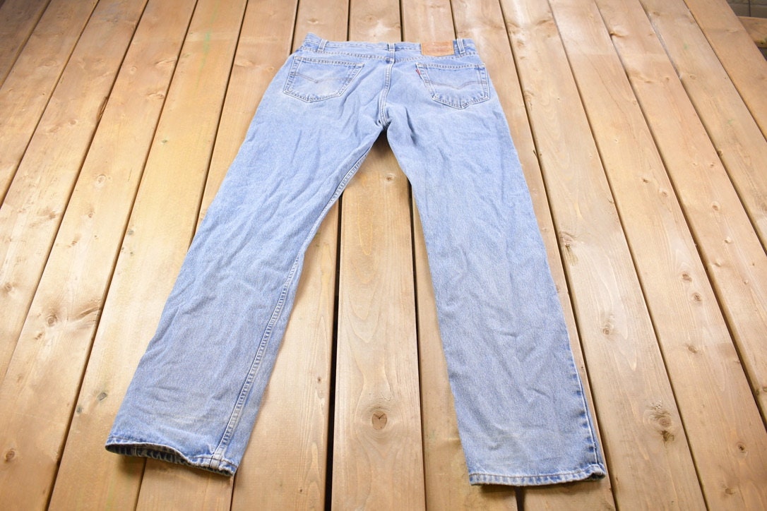 Vintage 1990s Levi's 505 Red Tab Light Wash Jeans Size 35 x 33 / Distressed Denim / Straight Leg Jeans / Vintage Levi's