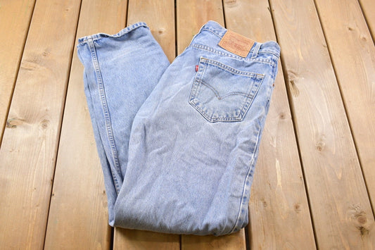 Vintage 1990s Levi's 505 Red Tab Light Wash Jeans Size 35 x 33 / Distressed Denim / Straight Leg Jeans / Vintage Levi's