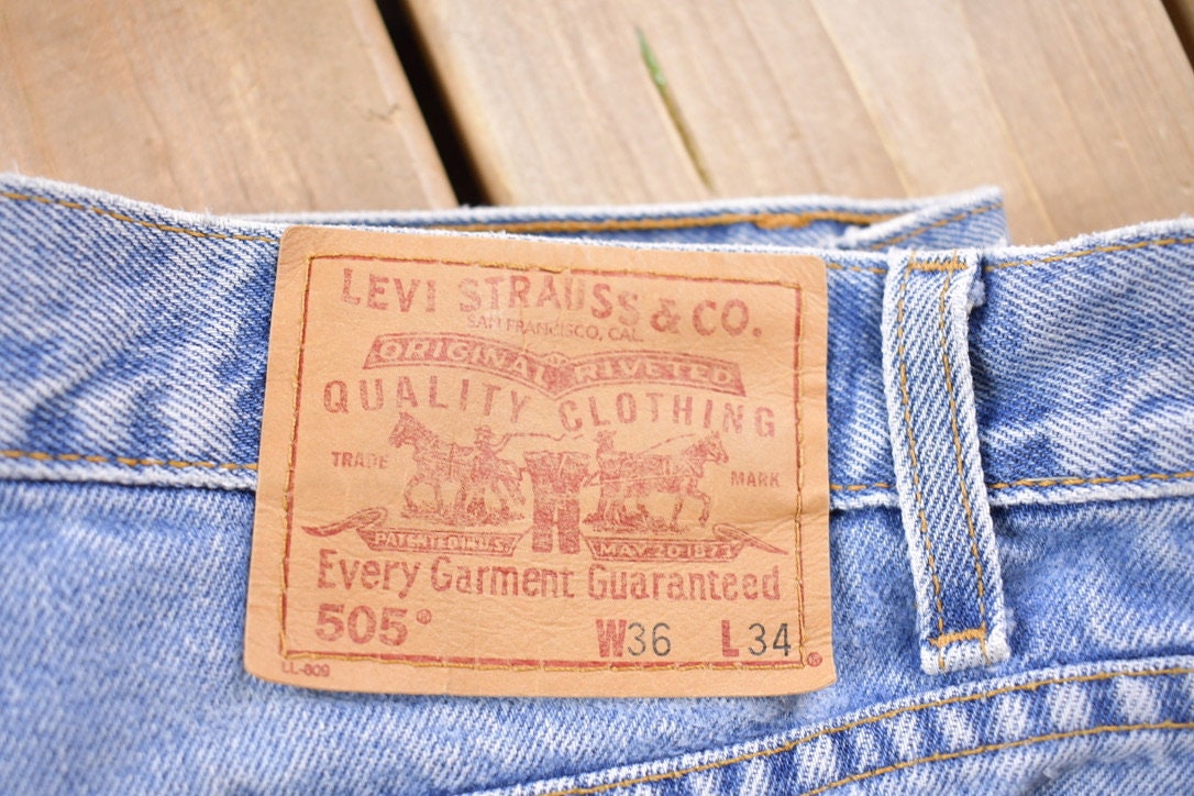 Vintage 1990s Levi's 505 Red Tab Light Wash Jeans Size 35 x 33 / Distressed Denim / Straight Leg Jeans / Vintage Levi's