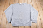 Vintage 1990s Nike Heather Grey Mini Swoosh Crewneck Sweatshirt