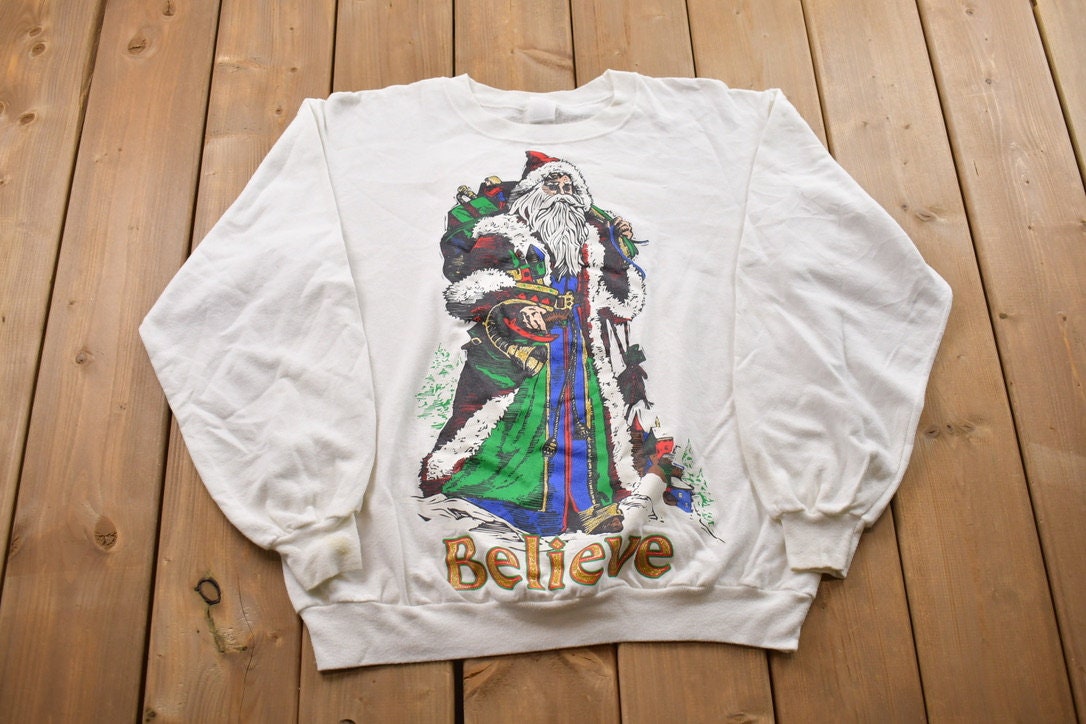 Vintage 1990s Old Saint Nick Christmas Sweater / 90s Holiday Crewneck / Winter / Festive Graphic Print / Believe Sweatshirt / Santa Claus