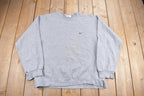 Vintage 1990s Nike Heather Grey Mini Swoosh Crewneck Sweatshirt